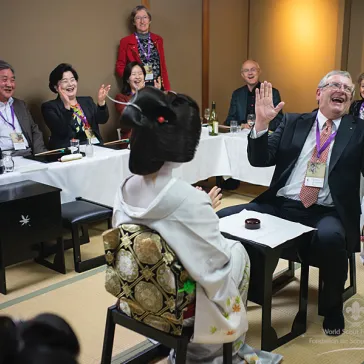 Rob Woolford being beating by a Geiko in a game